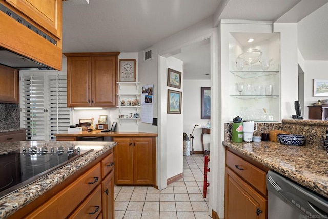 kitchen featuring light tile patterned floors, light stone counters, black electric stovetop, custom range hood, and stainless steel dishwasher