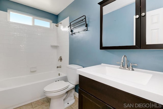 full bathroom featuring vanity, bathtub / shower combination, tile patterned floors, and toilet