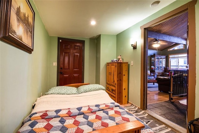 bedroom featuring lofted ceiling