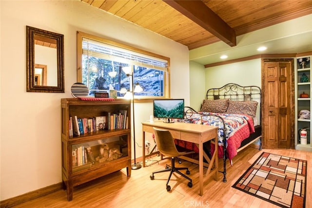 bedroom featuring wood ceiling, light hardwood / wood-style flooring, and beamed ceiling