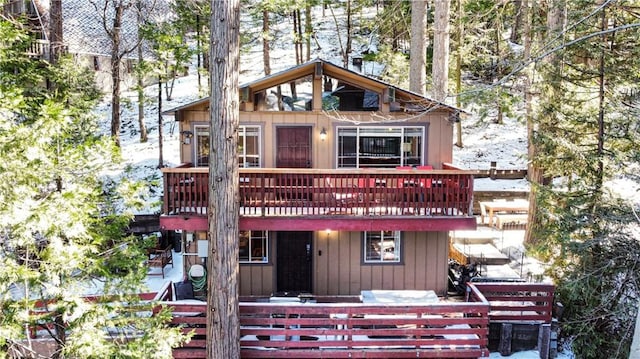 view of front of home with a deck