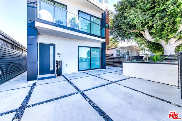 exterior space with a patio area