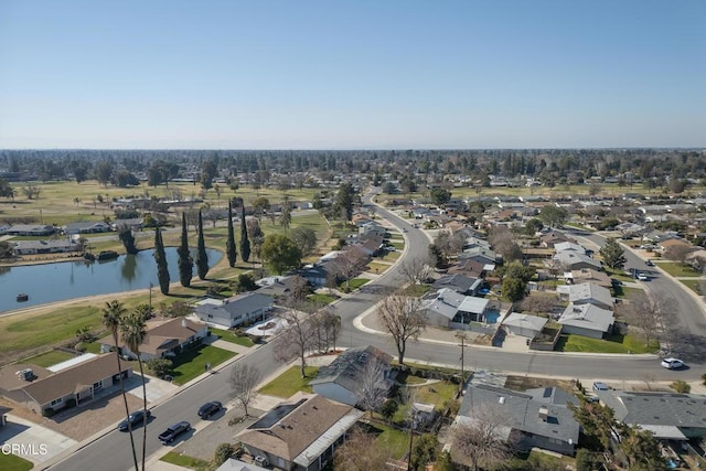 aerial view with a residential view and a water view