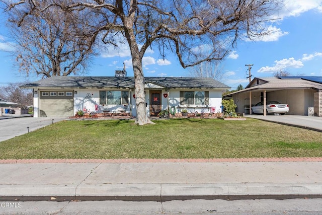 ranch-style home with stucco siding, concrete driveway, an attached garage, a front yard, and a carport