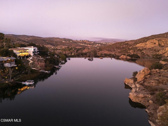 property view of water featuring a mountain view