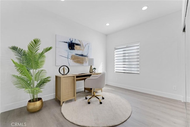 office area featuring recessed lighting, wood finished floors, and baseboards