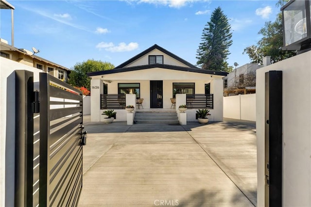 exterior space with fence and stucco siding