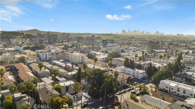 drone / aerial view featuring a city view