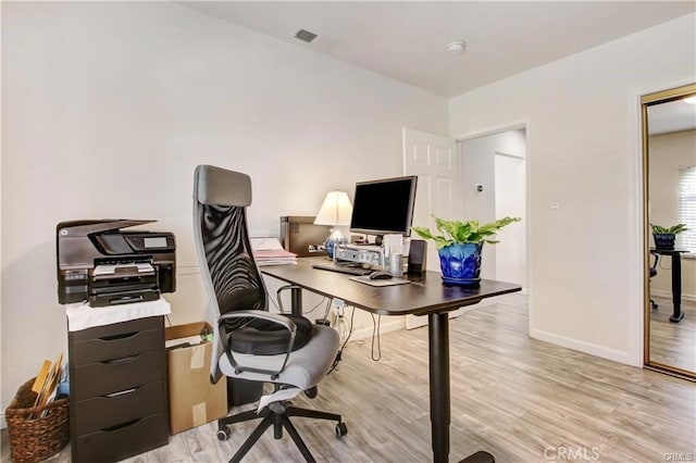 office area featuring light wood-type flooring