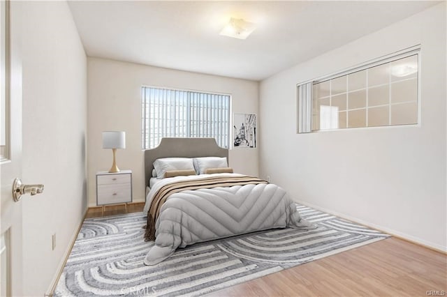 bedroom featuring light wood-type flooring