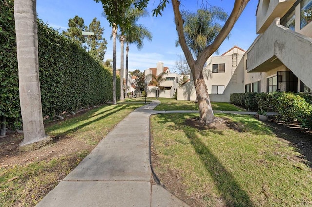 view of community featuring a lawn