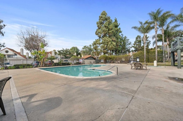 view of swimming pool featuring a patio