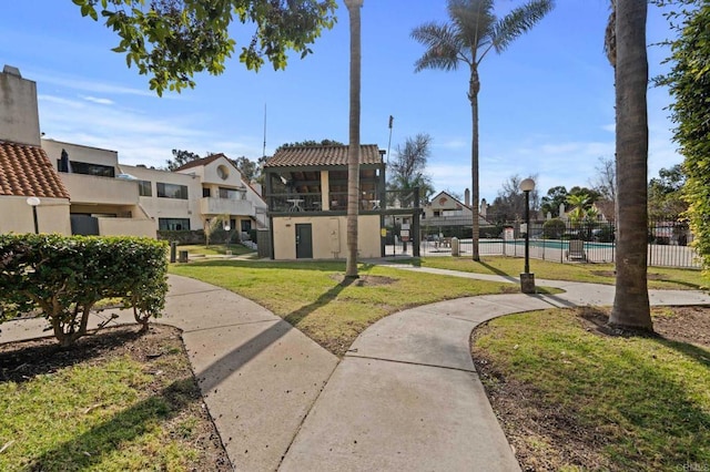 view of community featuring a lawn