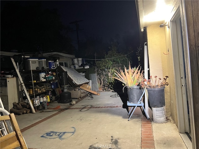 view of patio at night