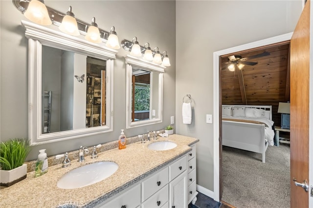 bathroom featuring ceiling fan and vanity