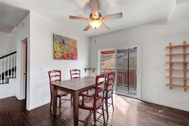 dining area with dark hardwood / wood-style floors and ceiling fan