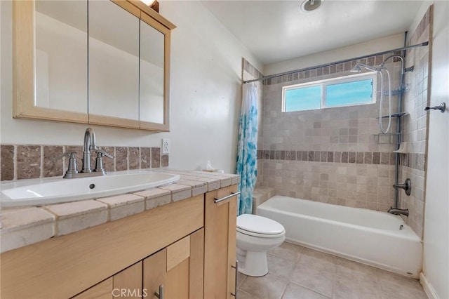 full bathroom with tile patterned flooring, vanity, shower / bath combination with curtain, and toilet