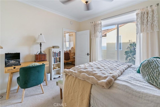 bedroom featuring a ceiling fan, crown molding, and light colored carpet