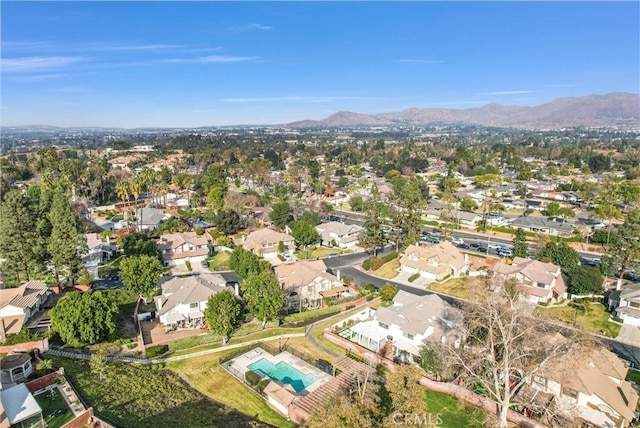 drone / aerial view featuring a mountain view