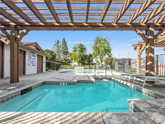 view of pool featuring a pergola and a patio area