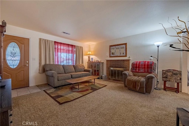 tiled living room featuring a fireplace