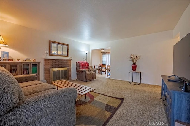 carpeted living room featuring a brick fireplace