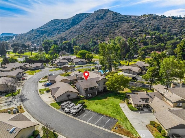 birds eye view of property featuring a residential view and a mountain view