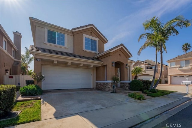 view of front of property featuring a garage