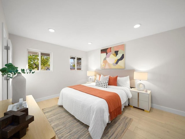 bedroom with light hardwood / wood-style flooring