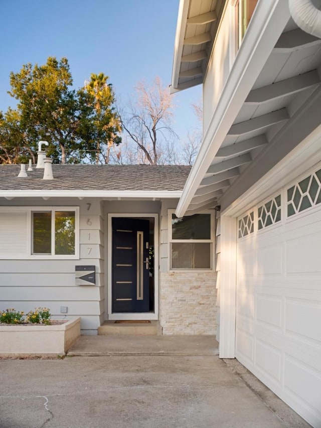 entrance to property with a garage