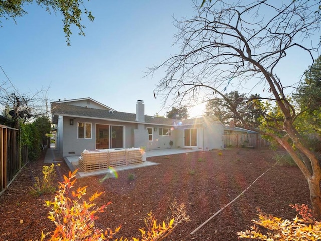 back of house featuring a patio