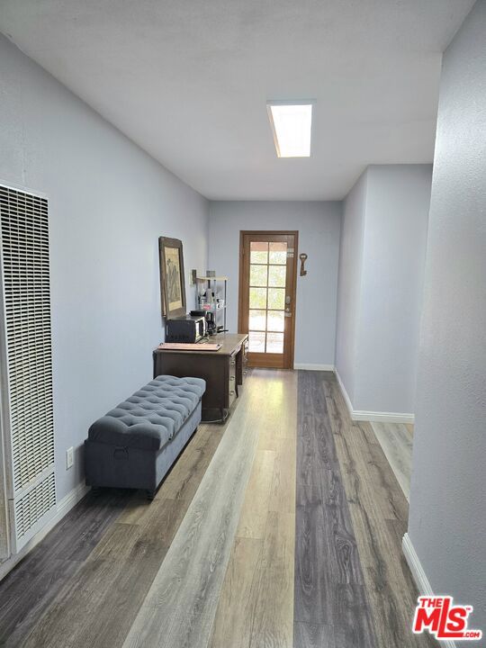 interior space with hardwood / wood-style floors