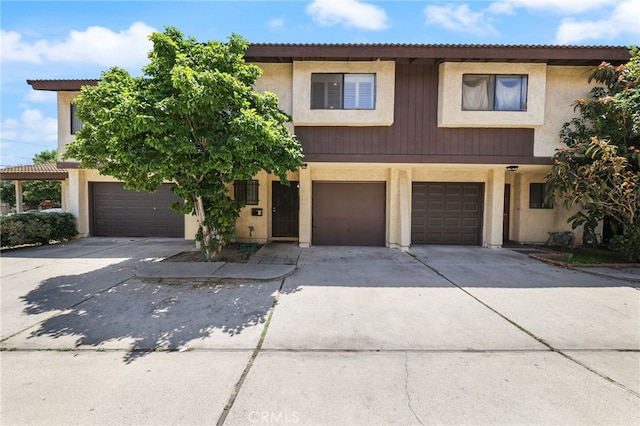 509 N Sierra Vista St Unit B, Monterey Park, CA 91755 - view of front of property with driveway, an attached garage, and stucco siding