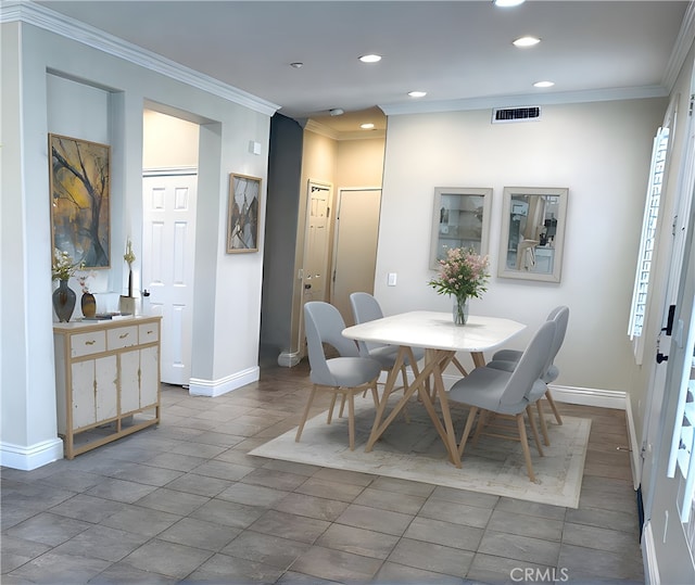 dining area with ornamental molding