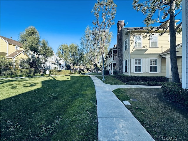 view of community with a lawn