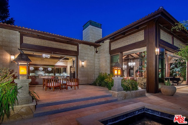 view of patio at twilight