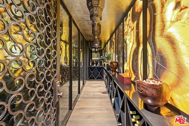 wine area featuring light hardwood / wood-style flooring