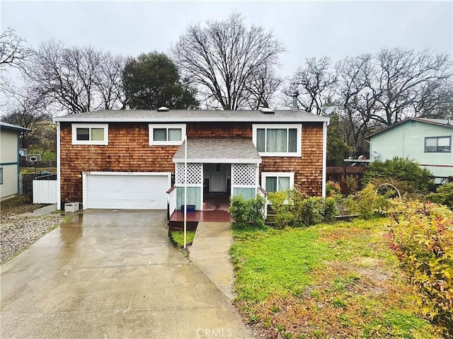 bi-level home featuring a garage