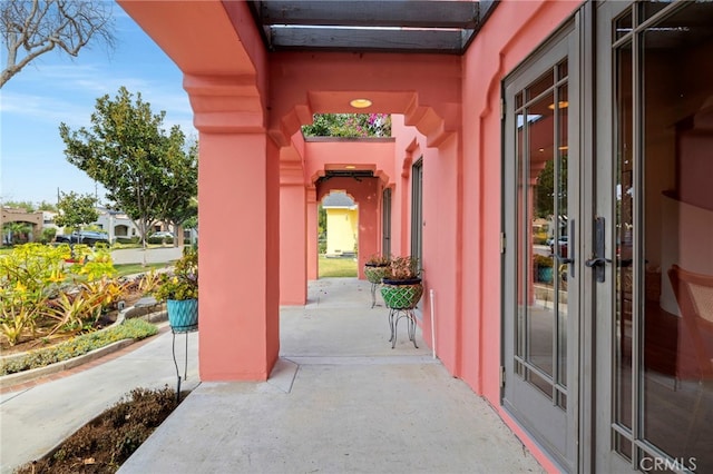 entrance to property featuring french doors