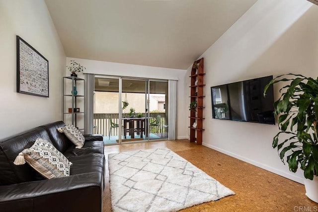 living room featuring vaulted ceiling