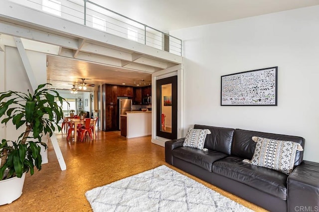 living room with ceiling fan