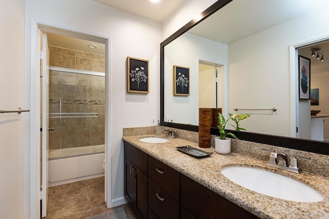 1775 Diamond Unit 308, Pacific Beach San Diego, CA 92109 - bathroom featuring double vanity, enclosed tub / shower combo, toilet, and tile patterned floors