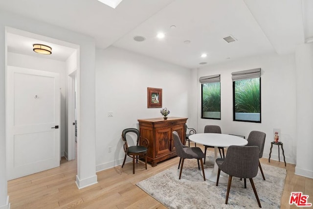 dining space featuring light hardwood / wood-style floors