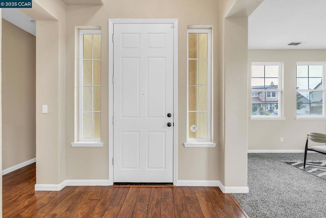 entrance foyer featuring hardwood / wood-style flooring