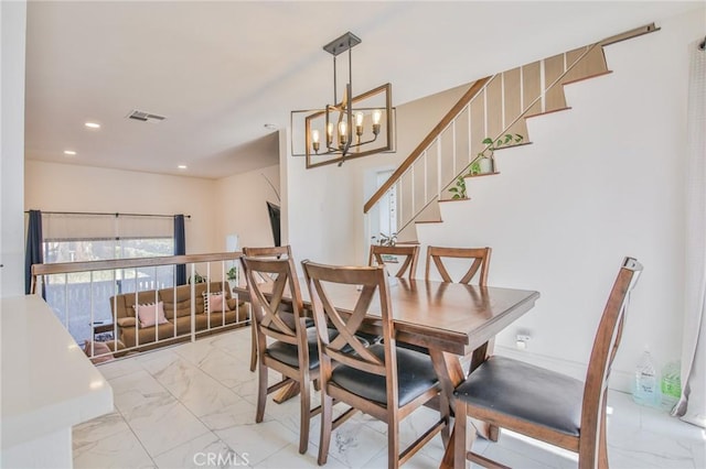 dining room with an inviting chandelier