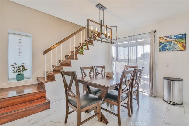 dining area featuring a chandelier