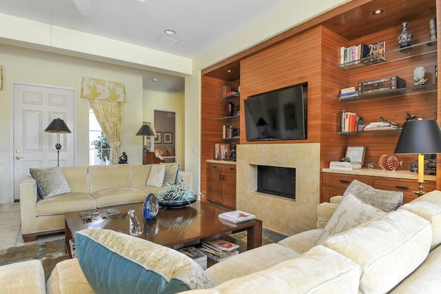 living room featuring a premium fireplace