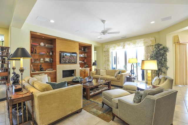 tiled living room featuring ceiling fan