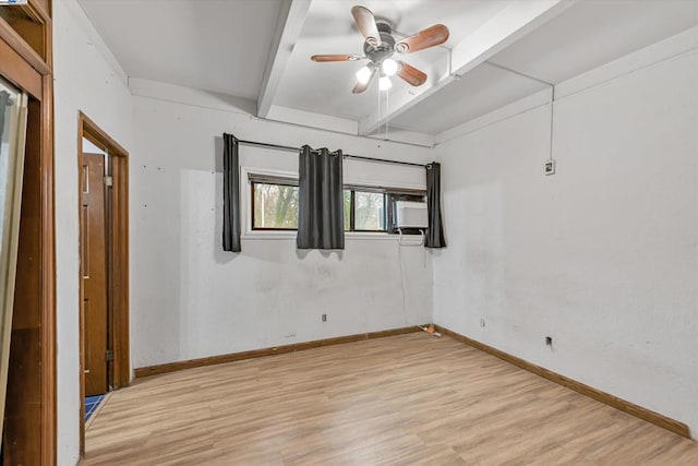 empty room with beamed ceiling, ceiling fan, and light wood-type flooring