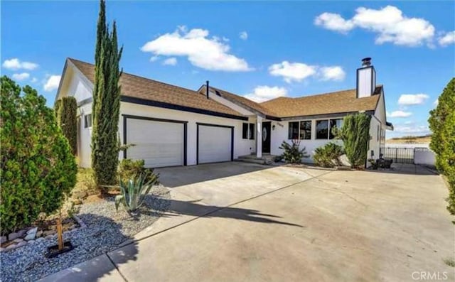 ranch-style home with a garage